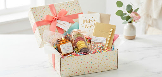 Confetti gift box with a Make a Wish card and sweet treats